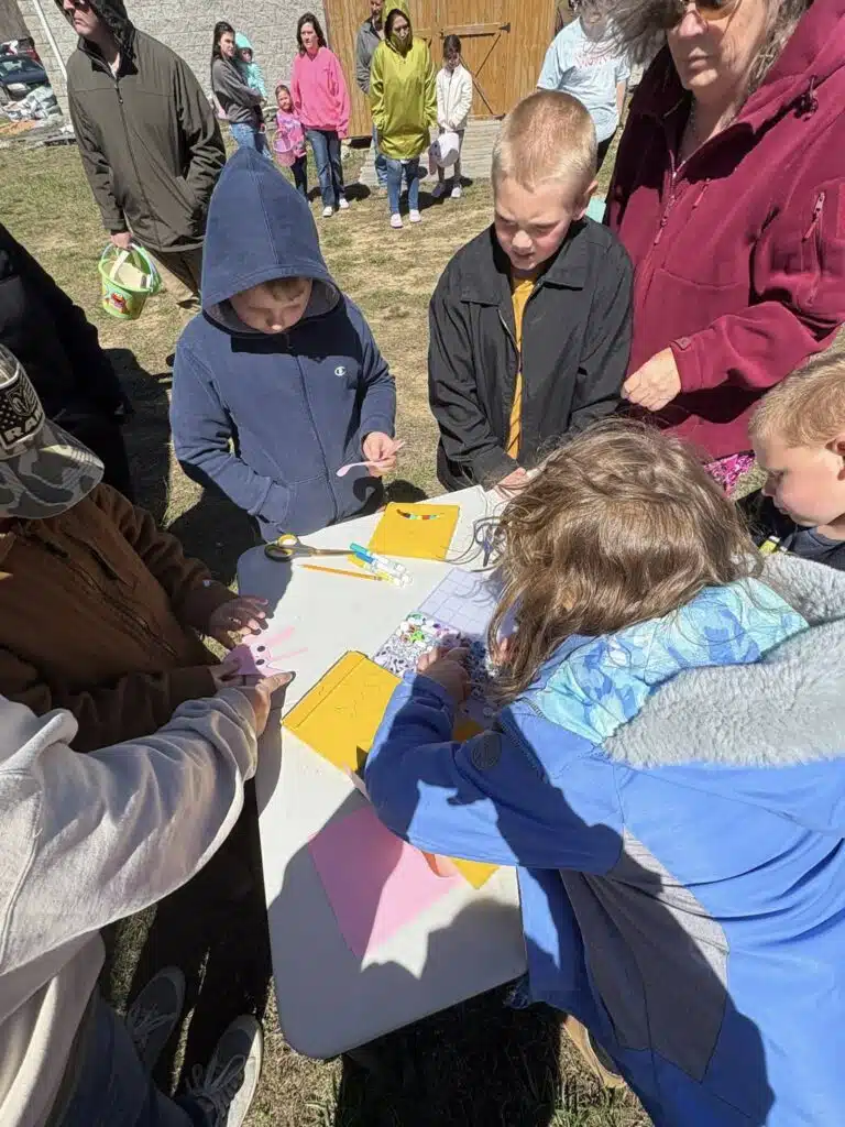 Image of children working on a craft.