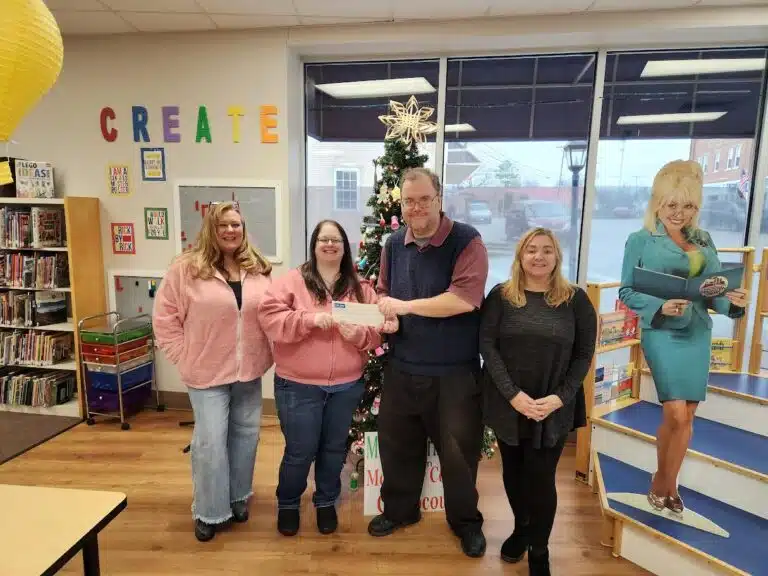 Pictured, left to right: Brenda Wooldridge (LAF Volunteer), Paige Coe (LAF Volunteer), Grady Wilson (MCPL Director), Rhonda Kendziorski (MCPL Assistant Director).
